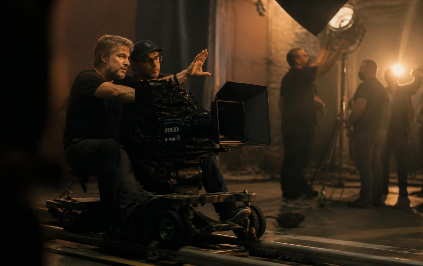 Director and DOP behind a RED cinema camera
